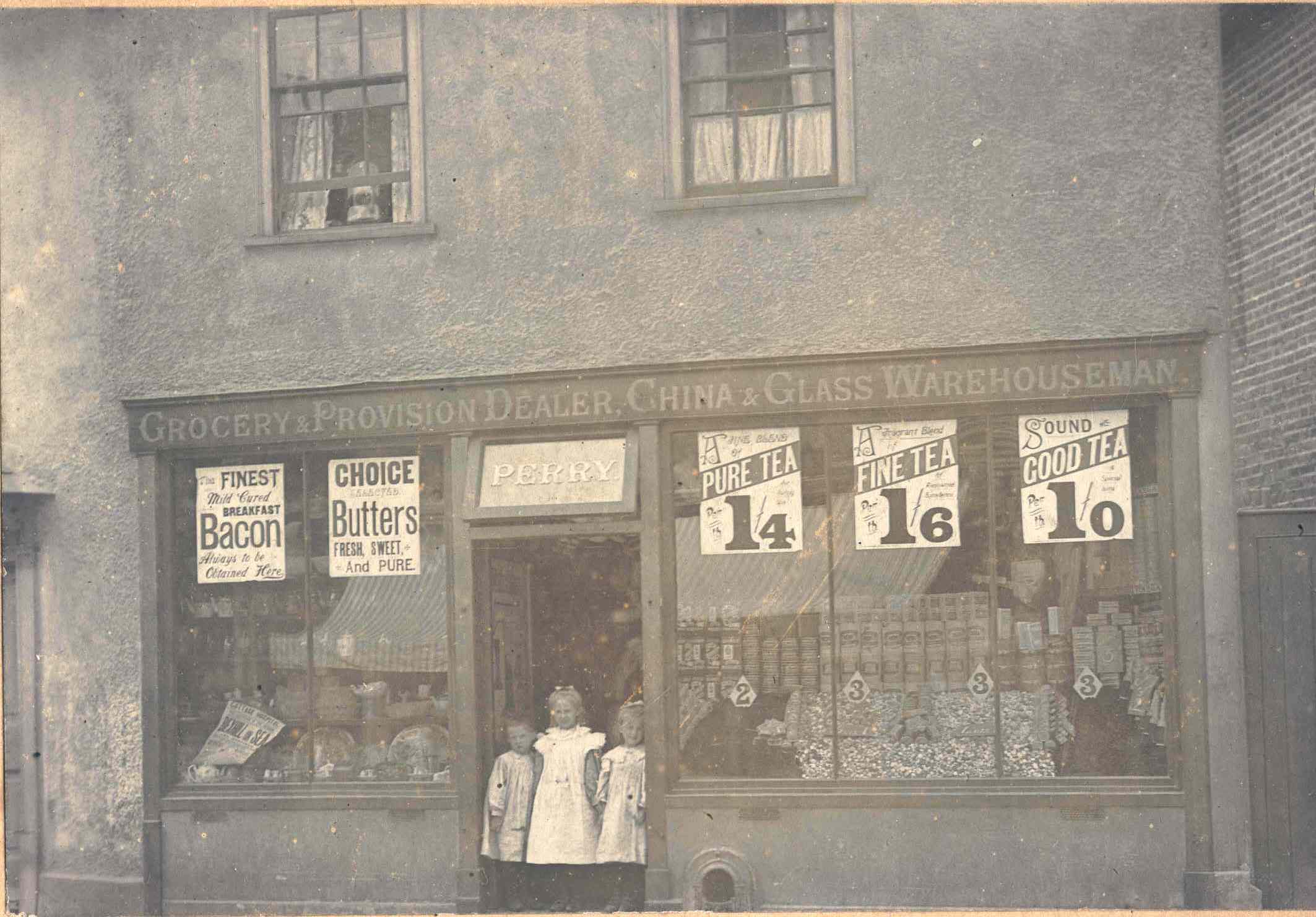 Very old black and white photo of a grocery store